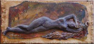 Ceramic Statuettes Mounted on Wood